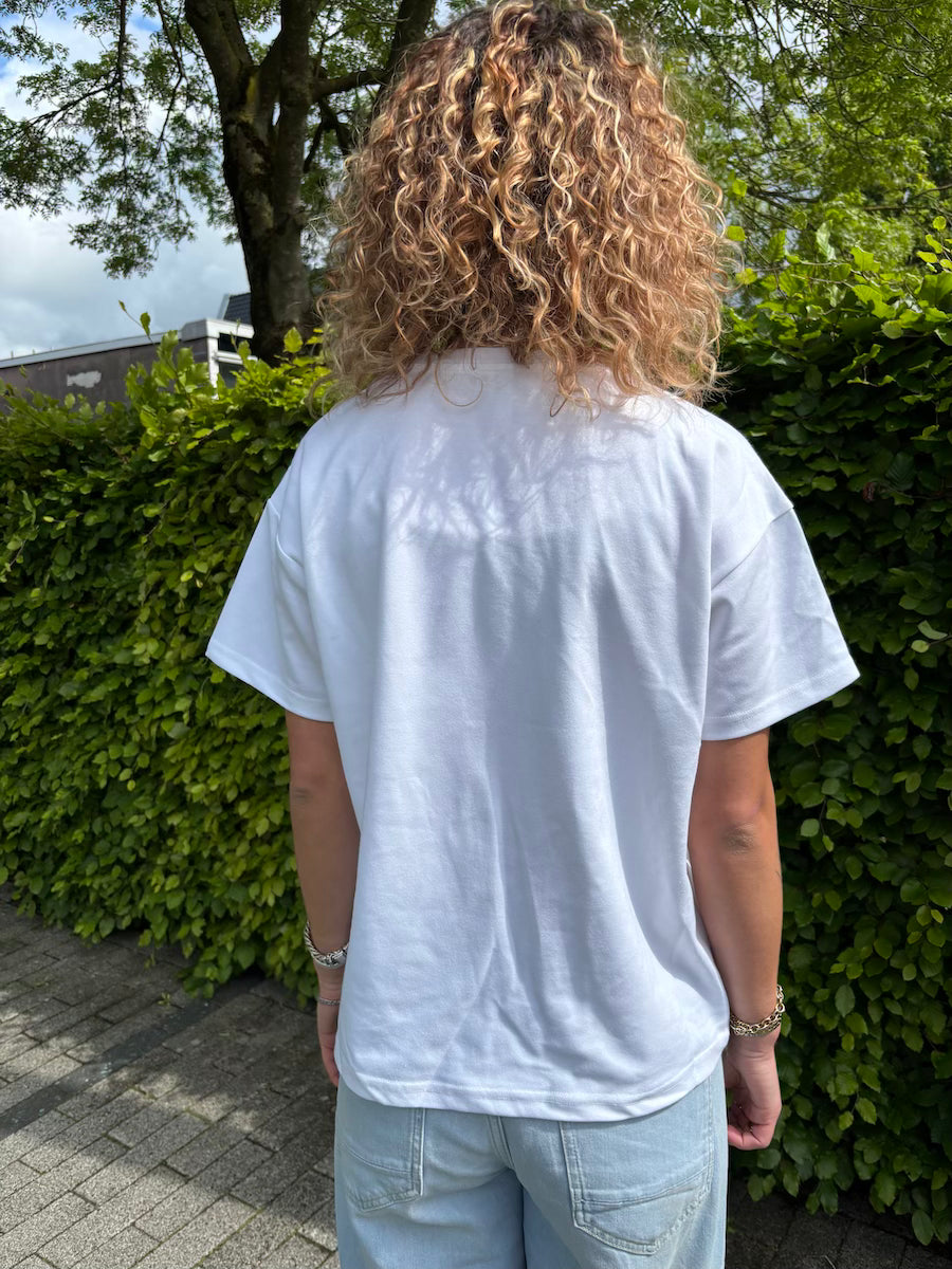 Wit t-shirt met bloem detail