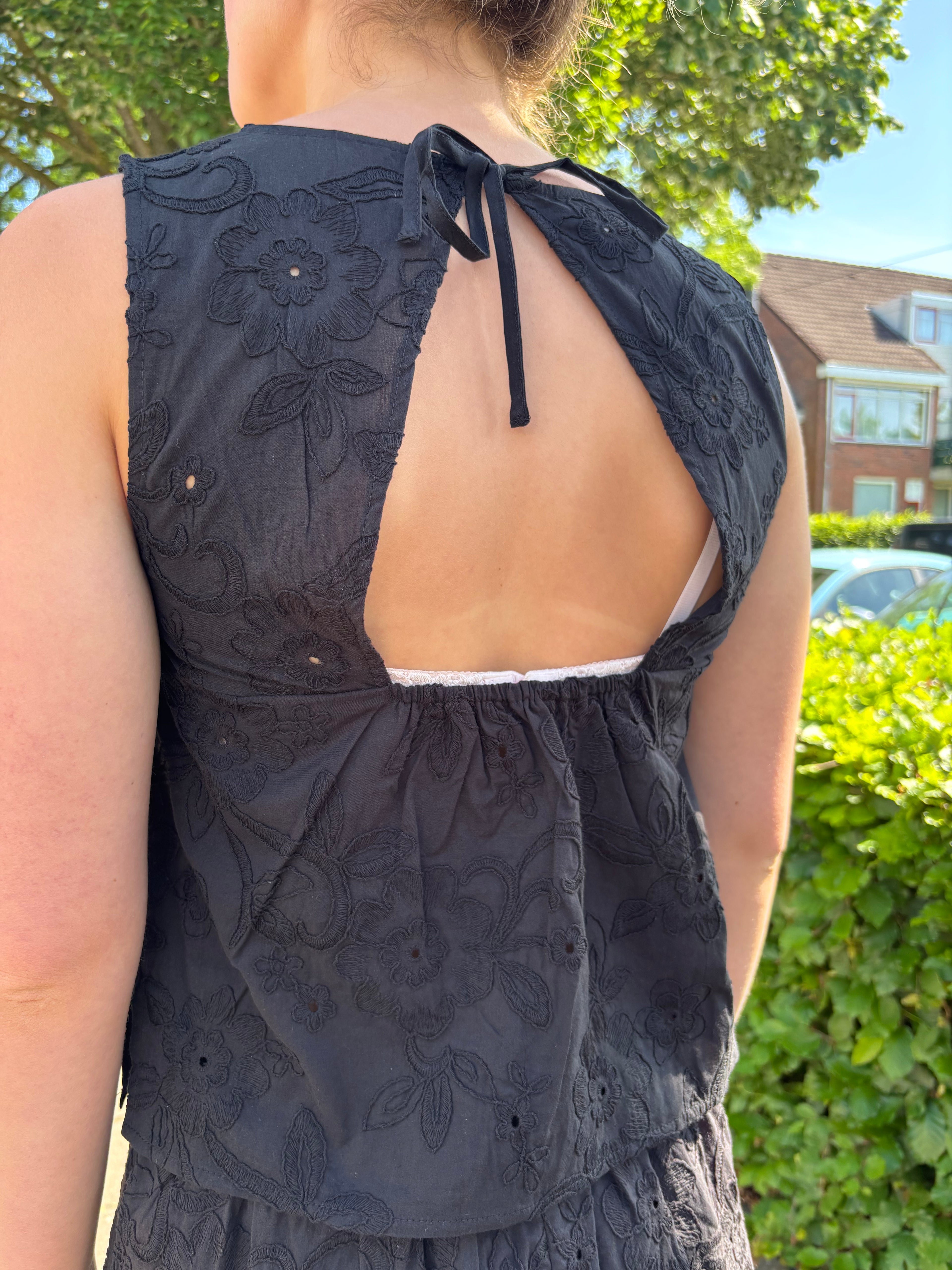 Top met open rug
