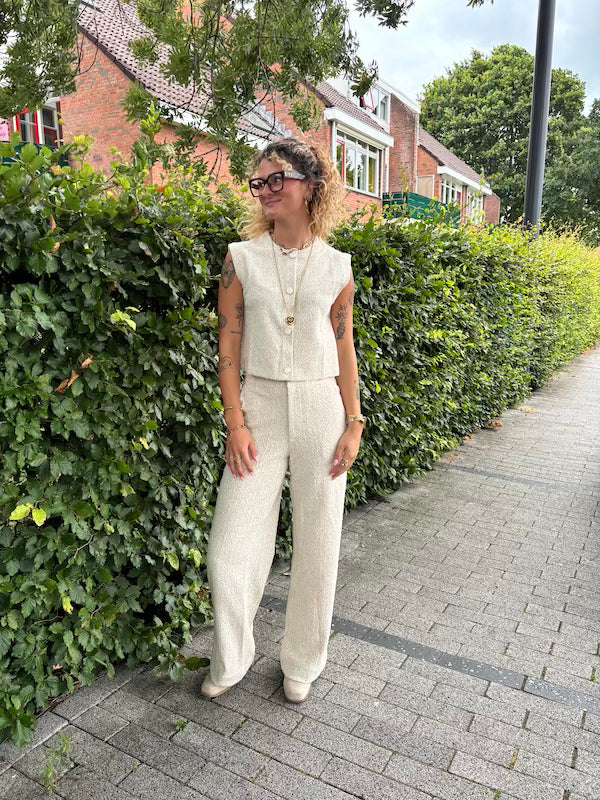 Gilet met gouden glitter