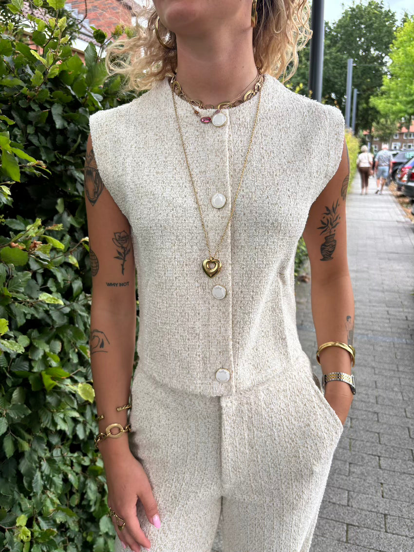 Gilet met gouden glitter