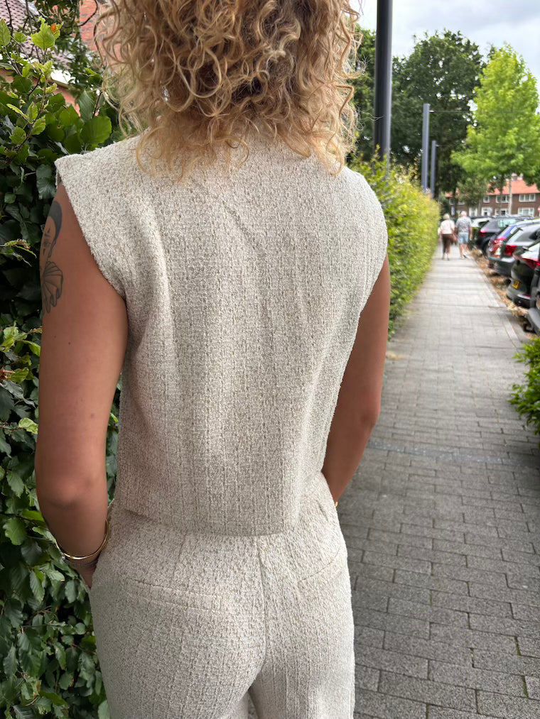 Gilet met gouden glitter