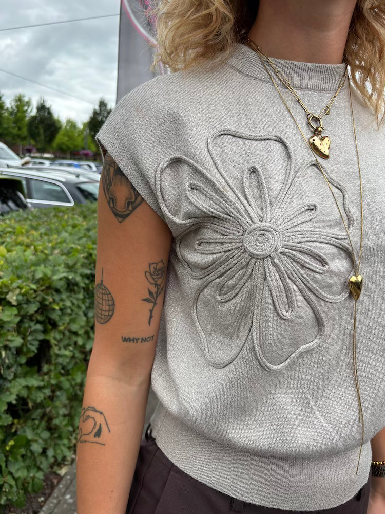 Knit top met bloem