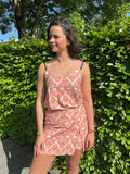 Top met oranje print