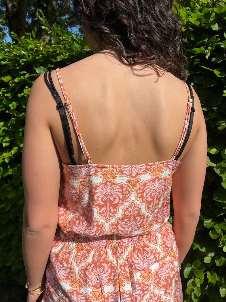 Top met oranje print