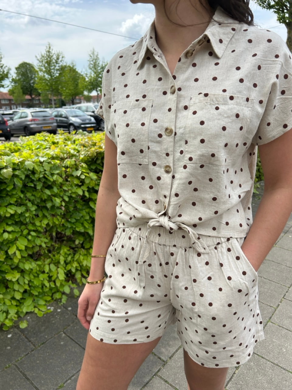 Polka dot blouse met knoop